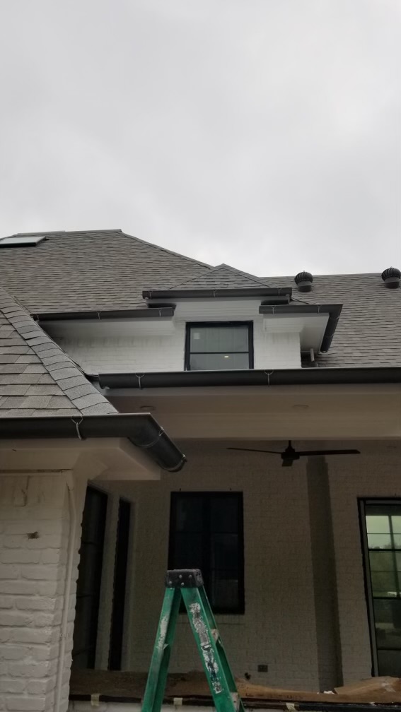 Seamless gutters installed on a new construction home in North Texas